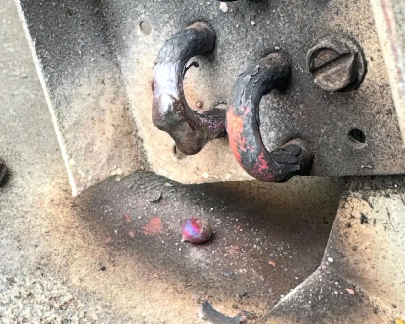 Heavily corroded copper tube connections inside an outdoor AC unit