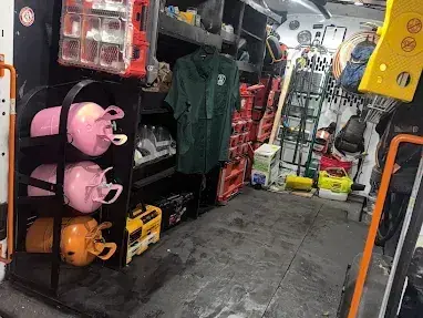 Inside a Service Shield service van, stocked with refrigerant, parts and tools